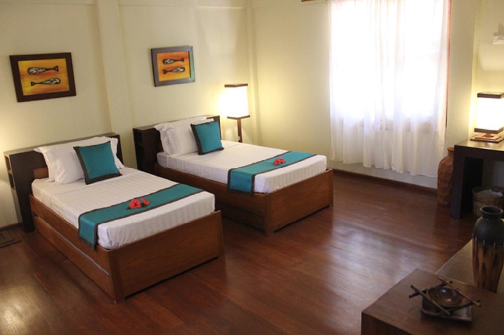 Asia Grand View Hotel Coron Room photo